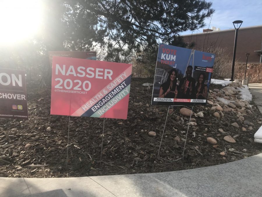 ASUU presidential campaign signs outside of the Union during the 2020 campaign season. (Photo by Natalie Colby | Daily Utah Chronicle)