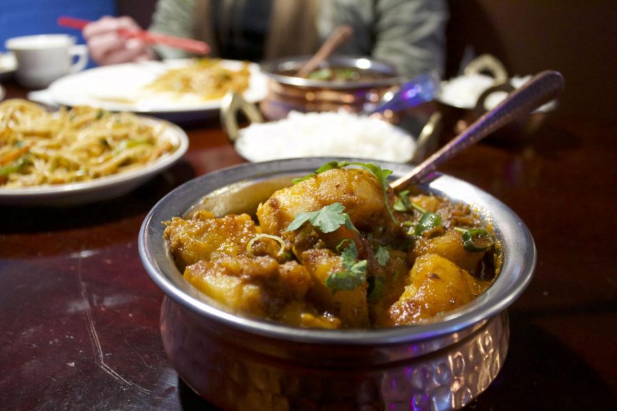 Dinner at House of Tibet featuring Spicy Potatoes (Photo by Kate Button I Daily Utah Chronicle)