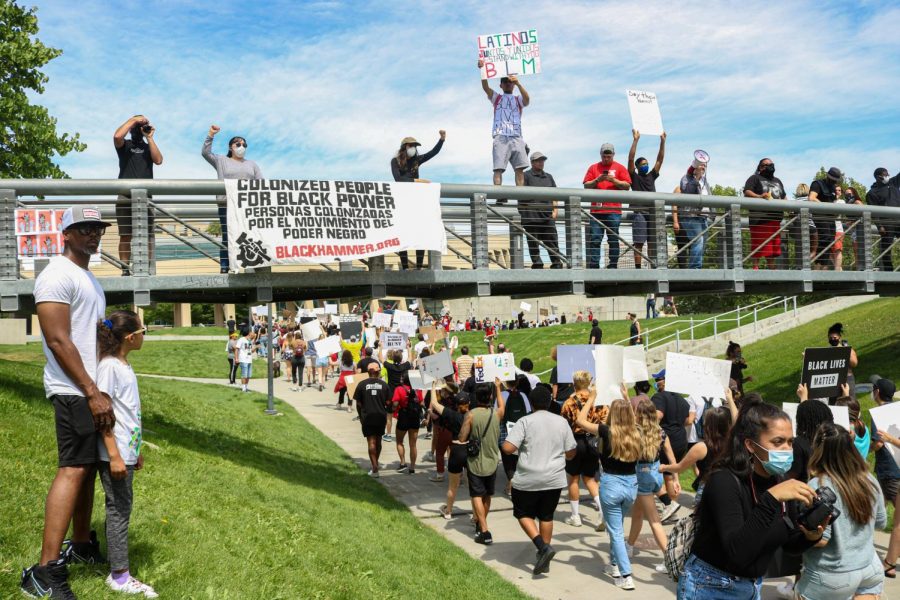 (Ivana Martinez | Daily Utah Chronicle) Black Lives Matters protesters march for George Floyd in downtown Salt Lake City on May 30, 2020.