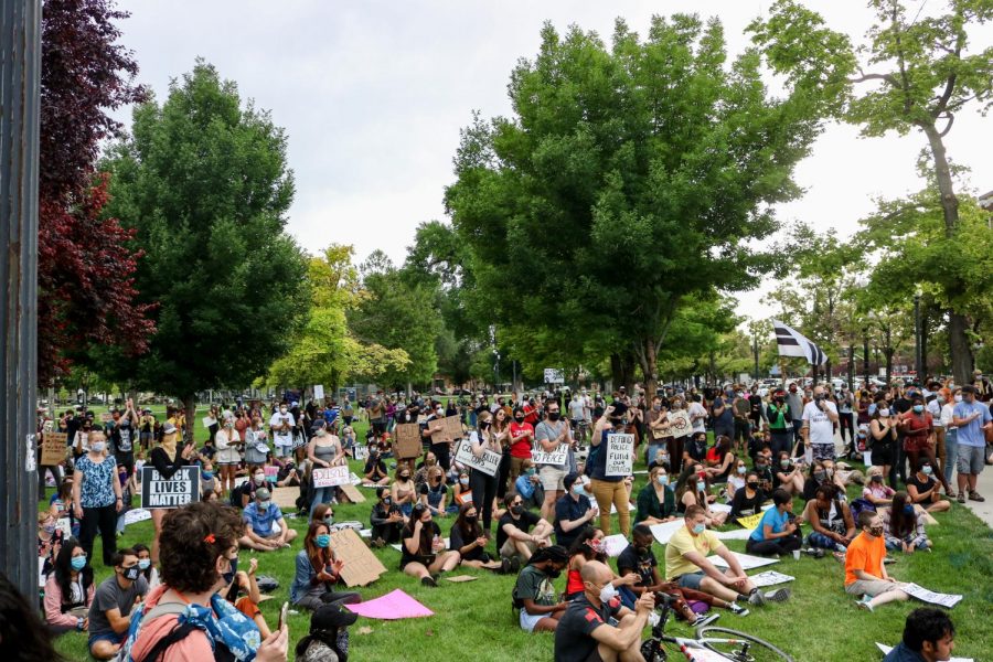 Protestors+at+Pioneer+park+listening+to+speakers+talk+at+the+protest+against+police+brutality+on+June+13%2C+2020.+%28Photo+by+Ivana+Martinez+%7C+Daily+Utah+Chronicle%29+