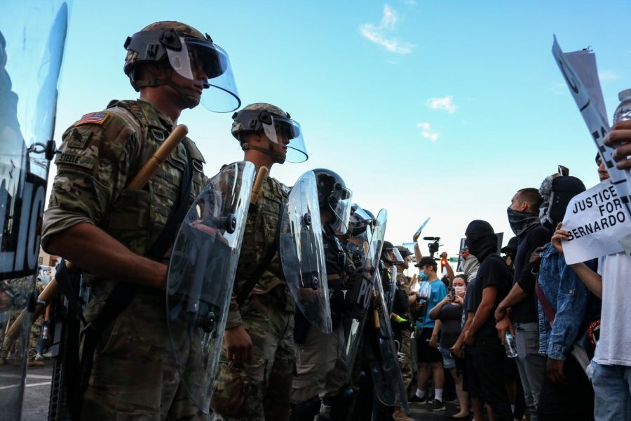 Protesters for the Black Lives Matter movement confront National Guard on 500 S. 200 East in Salt Lake City chanting why are you in riot gear? I dont see no riot here!(Photo by Ivana Martinez | The Daily Utah Chronicle)