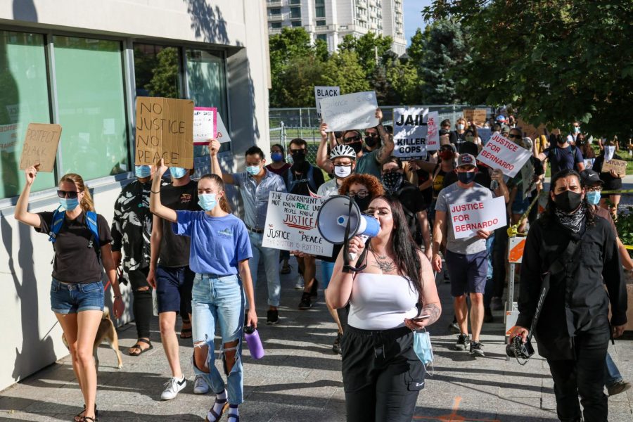 Sofia Alcala leads protesters downtown Salt Lake City to block intersection Main St. and 400 South on June 24, 2020 to demand murder charges against the police officers who killed Bernardo Palacios. (Photo by Ivana Martinez| Daily Utah Chronicle) 
