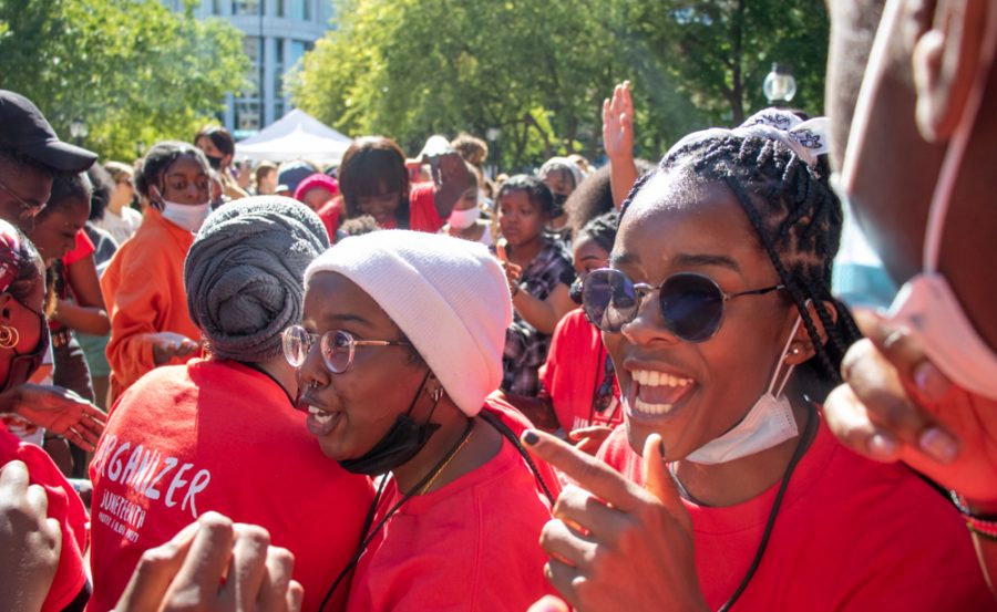 Attendees of the SLC Juneteenth celebration dance in front of the Salt Lake City and County Building on June 19, 2020. (Photo by Mark Draper | The Daily Utah Chronicle)