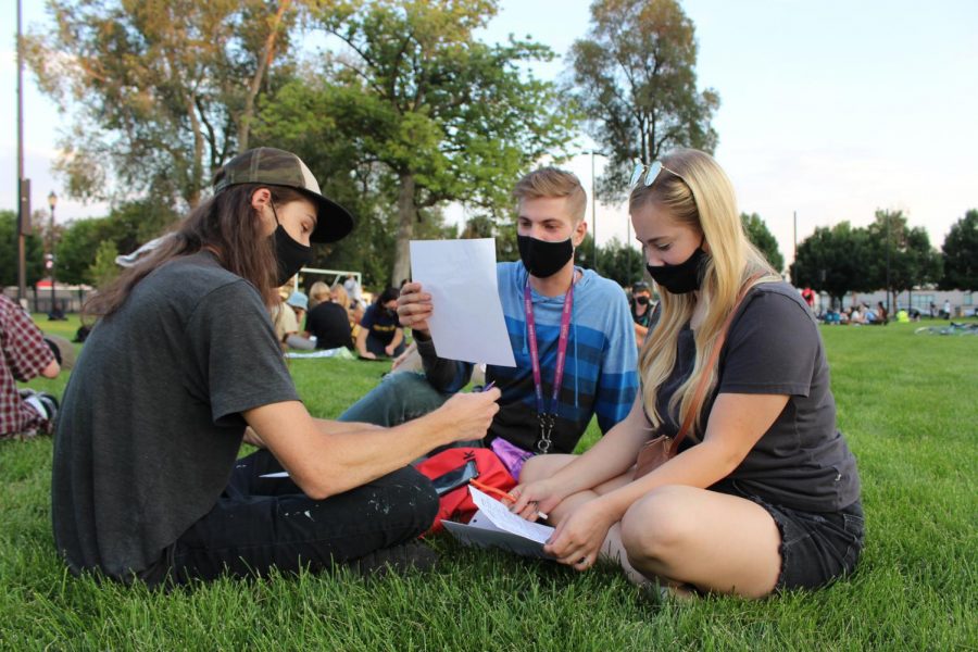Black Lives Matter demonstrators write letters to political prisoners at Pioneer Park on August 28, 2020 in Salt Lake City, Utah. (Photo by Gwen Christopherson | The Daily Utah Chronicle)