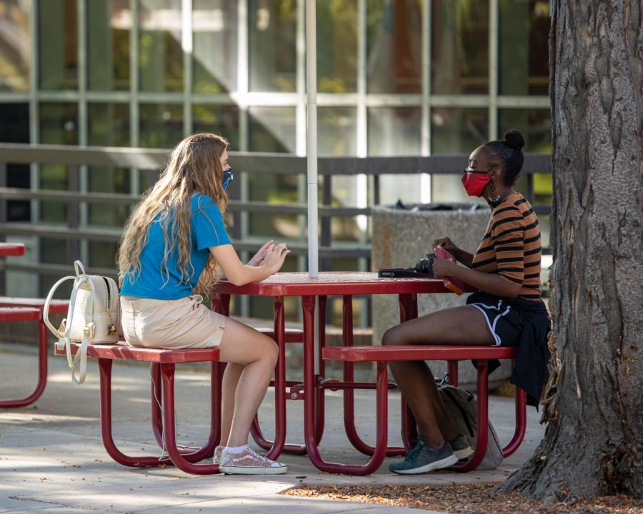 Students at the University of Utah are following the COVID-19 guidelines by wearing masks while working on campus. (Photo by Abu Asib | The Daily Utah Chronicle)