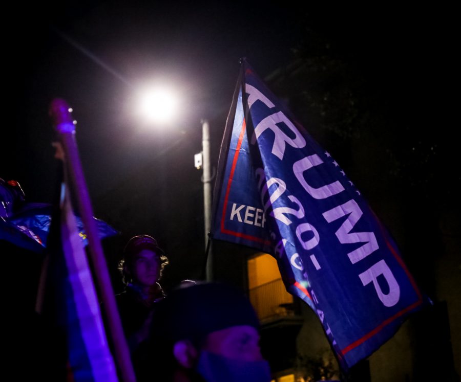 Trump supporters stand with other protesters at the intersection of 1300 E and 200 S in Salt Lake City, UT on October 7, 2020.(Photo by Jack Gambassi | The Daily Utah Chronicle)