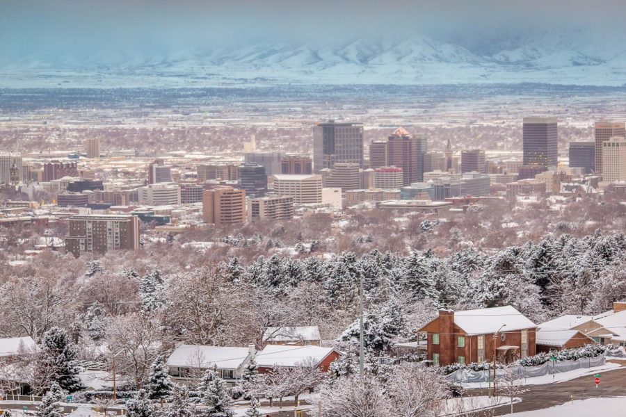 The+Salt+Lake+City+downtown+looking+so+dreamy+during+a+snowstorm+while+winter+inversion+lingers+over+the+Oquirrh+Mountain+Range+on+Feb.+20%2C+2018.