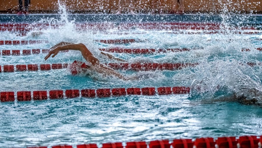 University of Utah Utes Men’s Swimming and Diving Team performs during a dual meet vs. University of Southern California at the Ute Natatoriam in Salt Lake City on Feb. 23, 2020. (Photo by Abu Asib | The Daily Utah Chronicle)