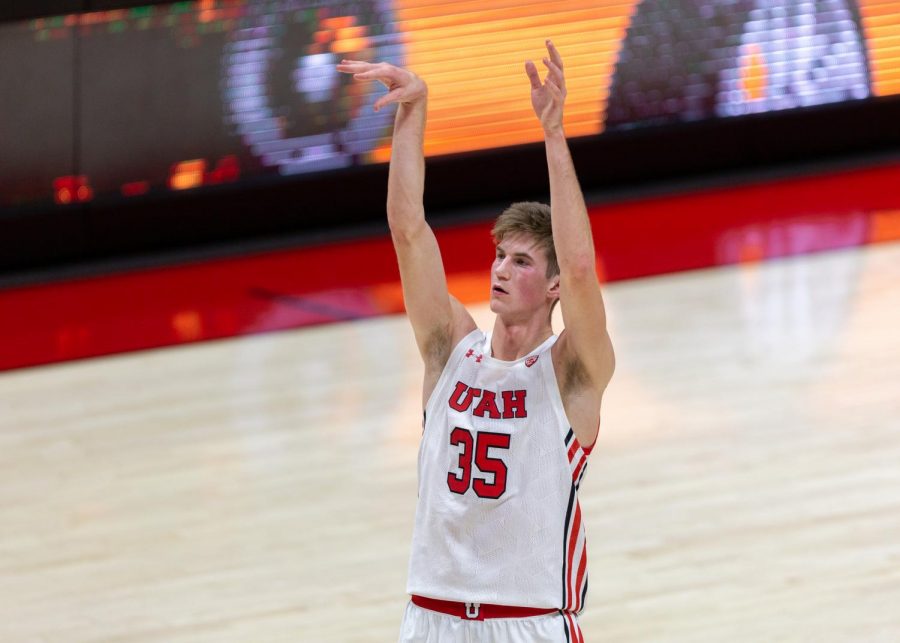 University of Utah mens basketball player Branden Carlson (#35) takes a free throw in the Utes win against Utah Valley on Dec. 15, 2020 in the Jon M. Huntsman Center in Salt Lake City. (Photo by Jack Gambassi | The Daily Utah Chronicle)