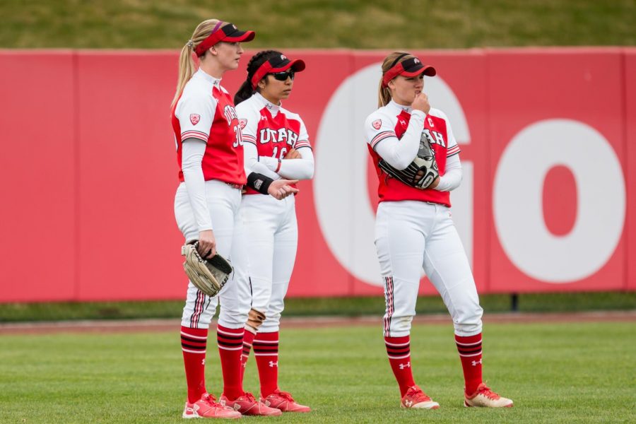 The University of Utah Softball Teams outfielders huddled up in an NCAA Softball game vs. Arizona at Dumke Family Softball Field in Salt Lake City, UT on Saturday April 06, 2019.(Photo by Curtis Lin | Daily Utah Chronicle)