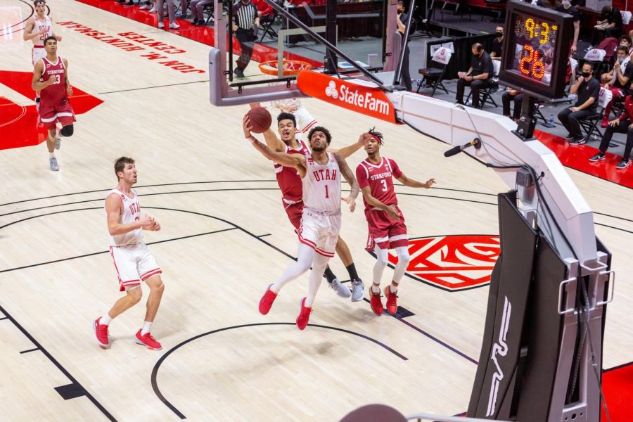 University of Utah junior forward Timmy Allen (1) goes for a layup during an NCAA Basketball game vs. the Stanford Cardinals at the Jon M. Huntsman Center in Salt Lake City, Utah on Thursday, Jan. 14, 2021. (Photo by Kevin Cody | The Daily Utah Chronicle)