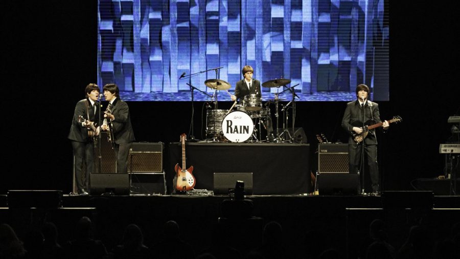 Rain: A Tribute to the Beatles performing at the Maverik Center on Friday, April 9, 2021. (Photo by Kevin Cody | Daily Utah Chronicle)