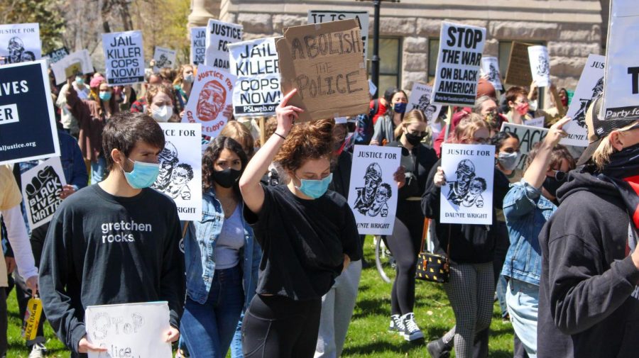 Demonstrators march from Washington Square Park to the city police department in Salt Lake City on April 17, 2021. (Photo by Gwen Christopherson | Daily Utah Chronicle)