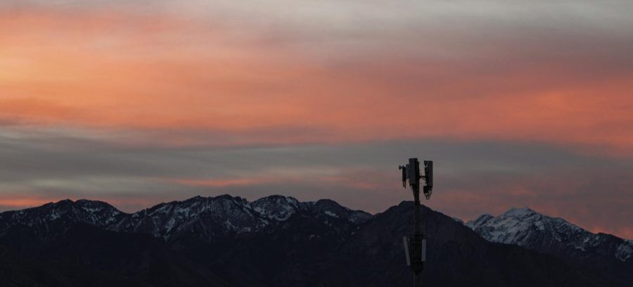 The sun rises over mountains in Salt Lake City on Friday, Nov. 13, 2021. (Photo by Brooklyn Critchley | The Daily Utah Chronicle)
