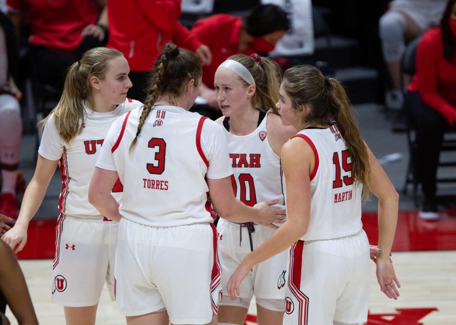 University of Utah women’s basketball player, Dru Gylten (10), talks to teammates Andrea Torres (3), Kemery Martin (15), and Brynna Maxwell (11), in the game against Arizona State University in the Jon M. Huntsman center in Salt Lake City on Dec. 18, 2020. (Photo by Jack Gambassi | The Daily Utah Chronicle)