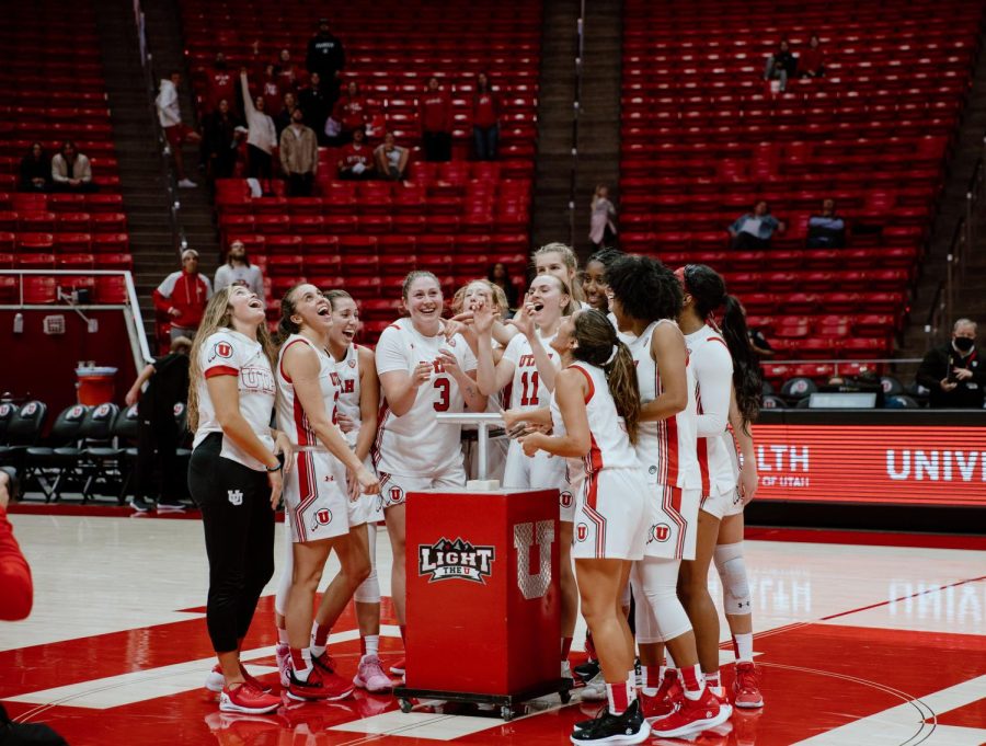 The+University+of+Utah+womens+basketball+team+celebrate+by+lighting+the+U+as+they+take+home+the+victory+against+Lipscomb+University+at+the+Huntsman+Center+in+Salt+Lake+City%2C+Nov.+10%2C+2021.+%28Photo+by+Rachel+Rydalch+%7C+The+Daily+Utah+Chronicle%29%0A
