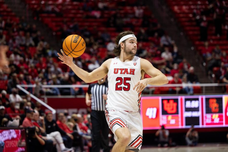 University of Utah mens basketballs guard Rollie Worster plays against USC Trojans on Saturday, Jan. 22 at the Jon. M. Huntsman Center in Salt Lake City, Utah. (Photo by Xiangyao Axe Tang | The Daily Utah Chronicle)
