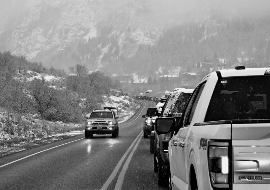 The traffic snake shows itself as skiers and snowboarders try to drive up Little Cottonwood Canyon on a snow day on Friday, Feb. 18, 2022. (Photo by Kevin Cody | The Daily Utah Chronicle)
