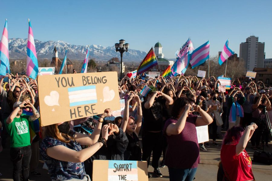 Protestors+hold+hearts+towards+transgender+youth+sitting+on+the+steps+of+the+Utah+State+Capitol+on+March+24%2C+2022.+%28Photo+by+Carlene+Coombs+%7C+The+Daily+Utah+Chronicle%29