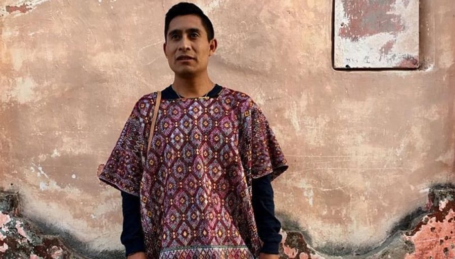Alberto Lopez Gomez wearing a huipil (traditional blouse) from his first collection Kuxul Pok (Courtesy Al Dia and Hilando Historias). 