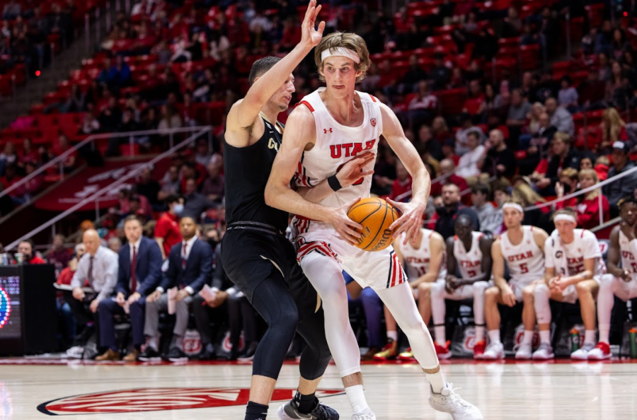 The University of Utah Utes mens basketball teams center Branden Carlson plays against the Colorado Buffaloes at the Jon M. Huntsman Center in Salt Lake City, Utah on Saturday March 5, 2022. (Photo by Xiangyao Axe Tang | The Daily Utah Chronicle)