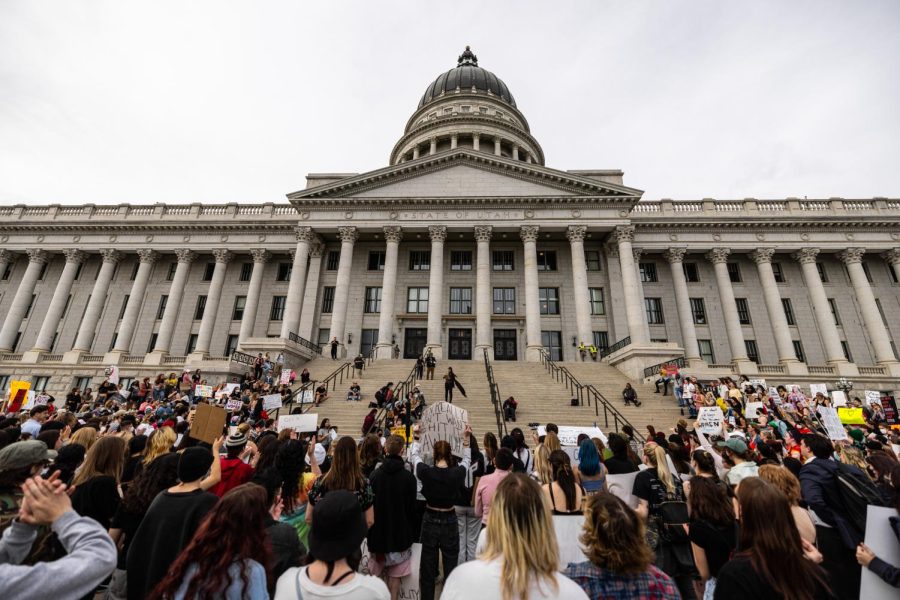 Demonstrators march up the steps of the Utah State Capitol in protest of the potential overturn of Roe v. Wade in Salt Lake City on May 5, 2022. (Photo by Xiangyao Axe Tang | The Daily Utah Chronicle)