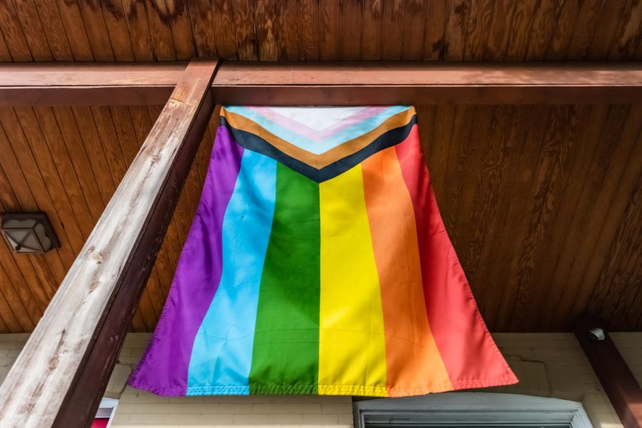 A progress pride flag hangs outside of a Salt Lake City home on June 22, 2022.