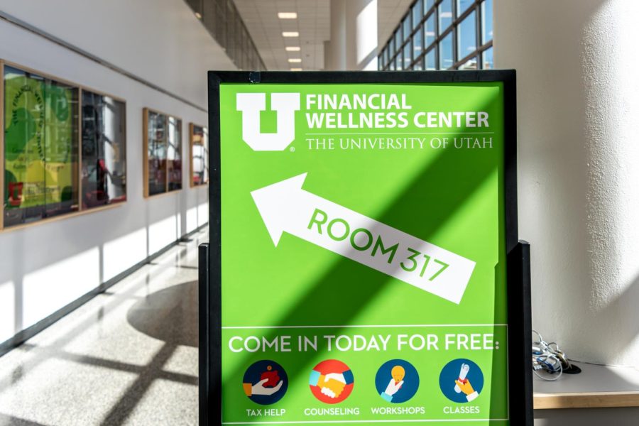 A sign describes some of the services offered by the financial wellness center, which can be found on the third floor of the A. Ray Olpin Union building on the University of Utah campus in Salt Lake City, Utah on July 1, 2022. (Photo by Jack Gambassi | The Daily Utah Chronicle)