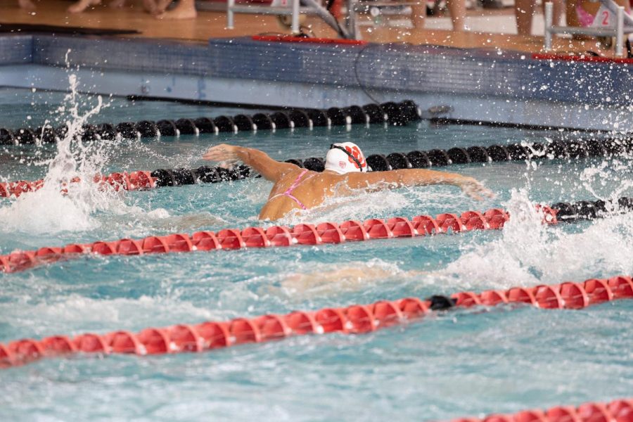 A University of Utah swimmer races during the intrasquad swim meet on Friday, Sept. 16, 2022 at Ute Natatorium on campus in Salt Lake City. (Photo by Jack Gambassi | The Daily Utah Chronicle)