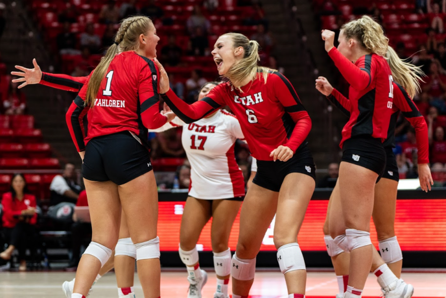 The University of Utah womens volleyball celebrates after a point against the BYU Cougars at the Jon M. Huntsman Center in Salt Lake City, Utah, on Sept. 15, 2022. (Photo by Xiangyao Axe Tang | The Daily Utah Chronicle)