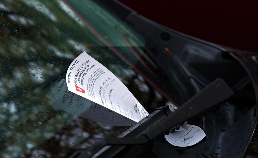A parking ticket on a car at the Marriott Library parking lot at University of Utah in Salt Lake City on Tuesday, Nov. 8, 2022.