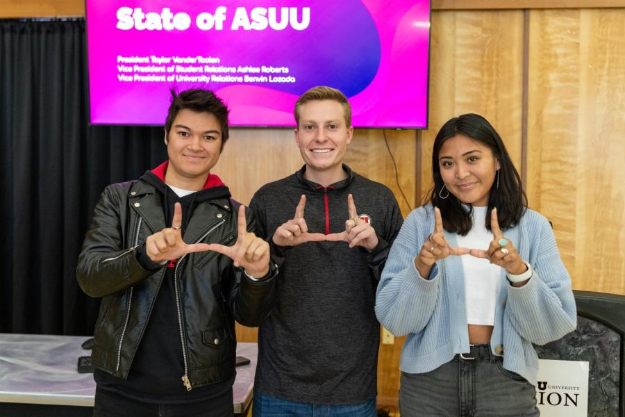The 2022-2023 ASUU Presidency flashing the U at the State of ASUU event at A. Ray Olpin University Union in Salt Lake City on Thursday, Nov.17, 2022. From left to right: Benvin Lozada, Vice President of University Relations. Taylor VanderToolen, ASUU President. Ashlee Roberts, Vice President of Student Relations.