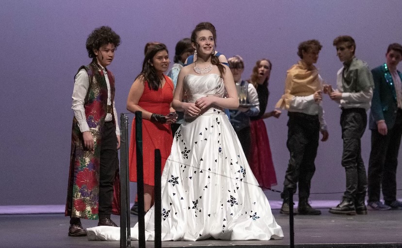 Photo of cast members in the original production of Morgan Champines play Corralis at Murray High School in 2022. Costumes by Morgan Champine.