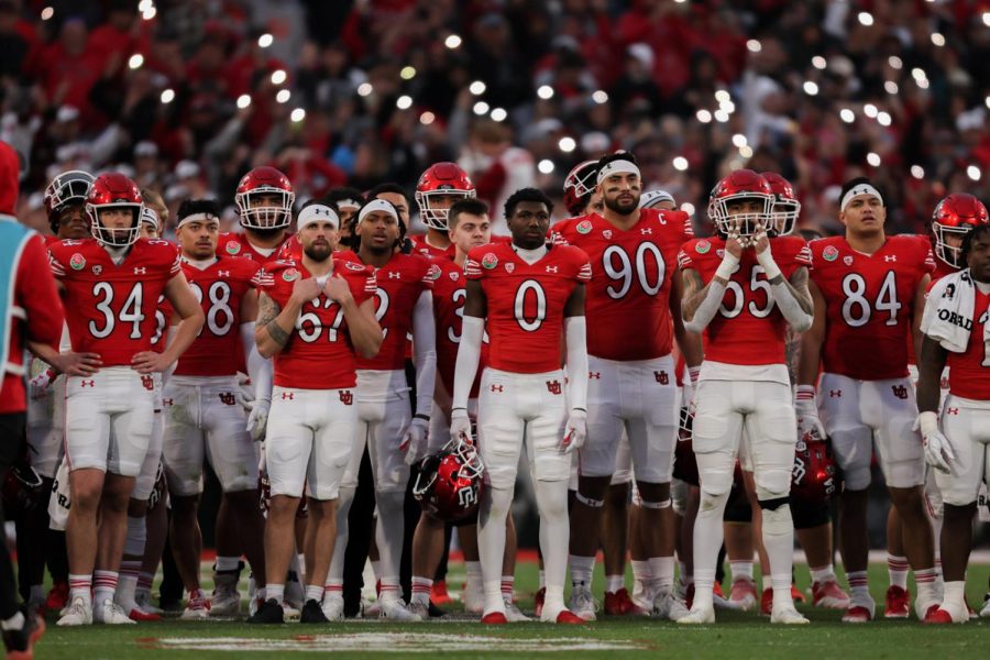 The Utah football team honors late teammates Aaron Lowe and Ty Jordan during the Moment of Loudness in the Rose Bowl game versus Penn State in Pasadena, CA on Jan. 2, 2023.