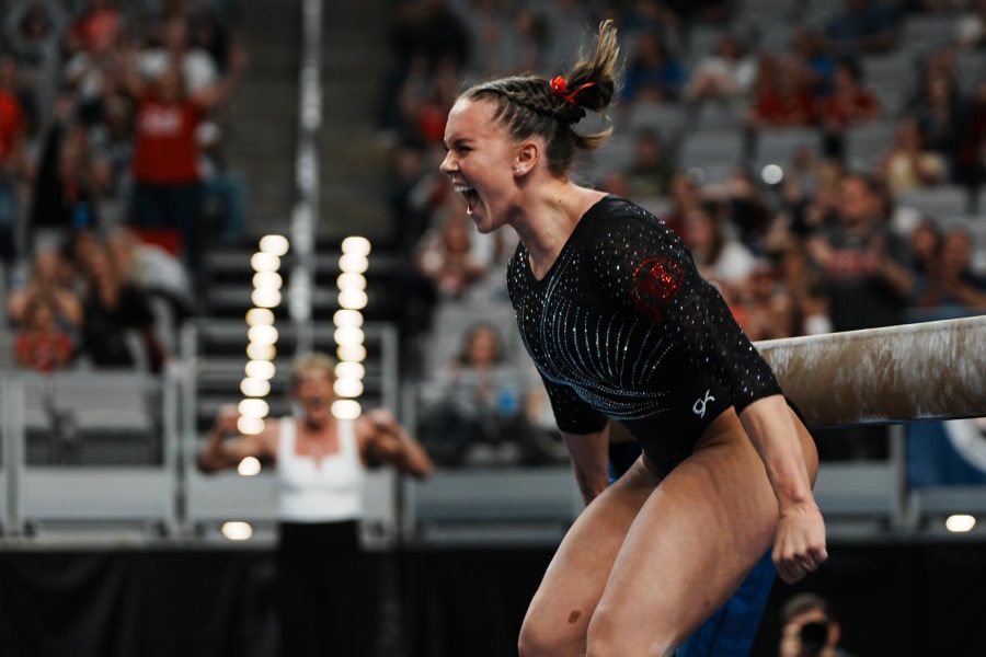 Utah Red Rocks’ Maile O’Keefe celebrates after her beam routines at the 2023 NCAA Women’s National Collegiate Gymnastics Championships at Dickies Arena in Fort Worth, TX, on Thursday, April 13, 2023. (Photo by Xiangyao “Axe” Tang | The Daily Utah Chronicle)