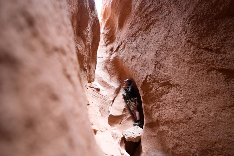 Bruce Shapiro looking up at students in the Escalante Desert on April 7, 2023 (Photo by Sophie Felici | The Daily Utah Chronicle)