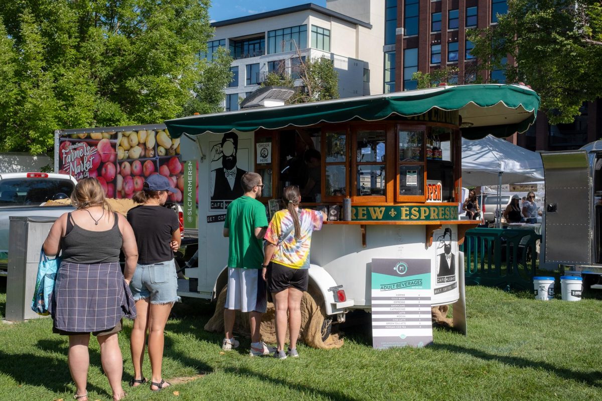 Market-goers shopping at Pioneer Park during the SLC Farmers Market in Salt Lake City on July 29, 2023. (Photo by Marco Lozzi | The Daily Utah Chronicle)