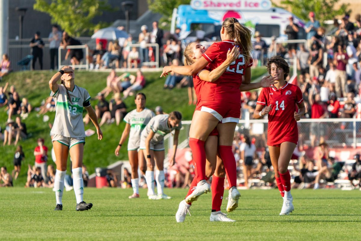 Utah midfielder Kyla Jennnings (22) and forward Kelly Bullock (7) celebrate after goal in the game versus the Utah Valley Wolverines at Ute Soccer Field in Salt Lake City, Utah, on Wednesday, Aug. 30, 2023. (Photo by Xiangyao “Axe” Tang | The Daily Utah Chronicle)