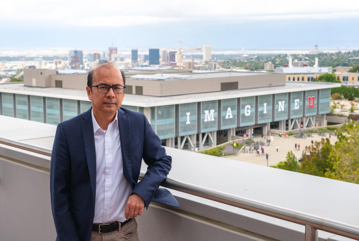 Chong Oh poses for a photo in the Spencer Fox Eccles Business Building at the University of Utah in Salt Lake City on Thursday, Sep. 21, 2023. (Photo by Marco Lozzi | The Daily Utah Chronicle)