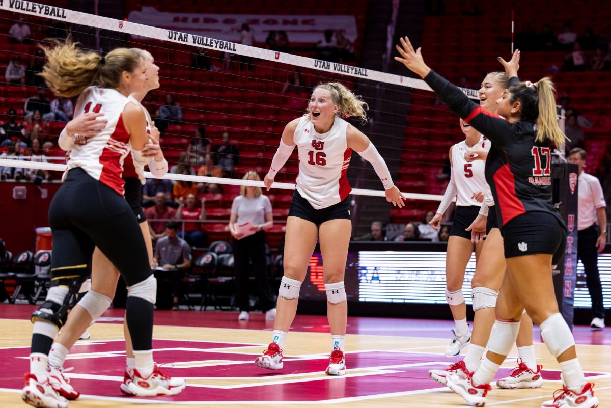 The Utah women’s volleyball celebrates after scoring versus the Oregon State Beavers at Jon M. Huntsman Center in Salt Lake City on Friday, Oct. 06, 2023. (Photo by Xiangyao “Axe” Tang | The Daily Utah Chronicle)