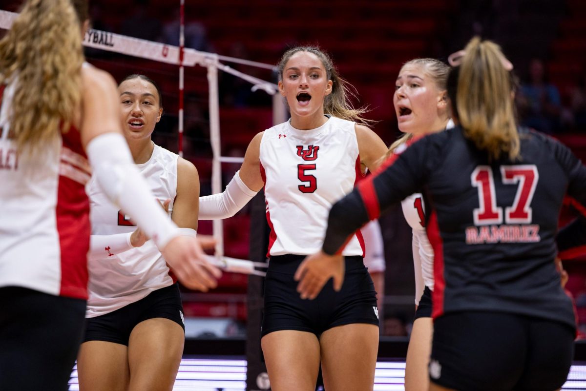 The Utah women’s volleyball celebrates after scoring versus the Oregon State Beavers at Jon M. Huntsman Center in Salt Lake City on Friday, Oct. 06, 2023. (Photo by Xiangyao “Axe” Tang | The Daily Utah Chronicle)