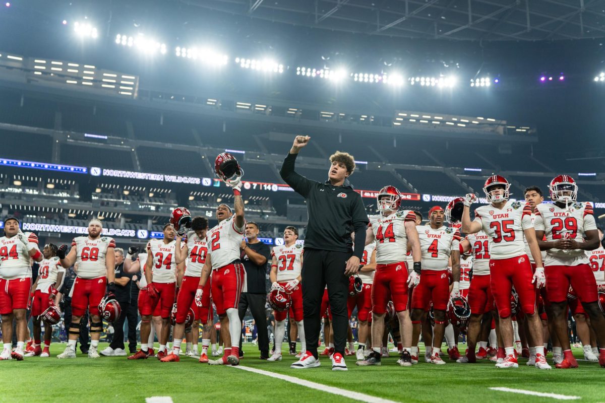 The Utah Utes cheer after the 2023 Las Vegas Bowl at Allegiant Stadium in Las Vegas, NV on Saturday, Dec. 23, 2023. (Photo by Xiangyao “Axe” Tang | The Daily Utah Chronicle)