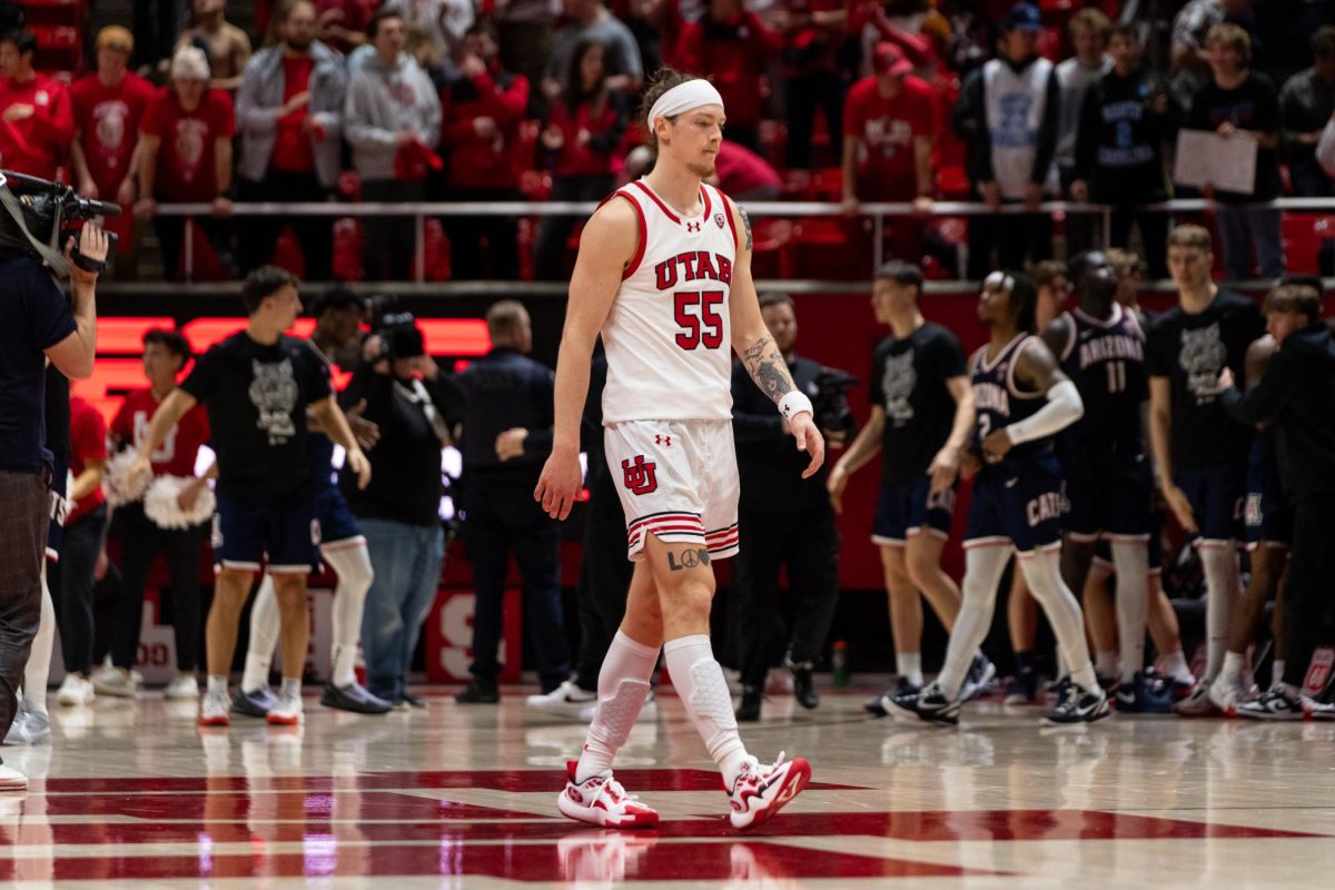 Utah guard Gabe Madsen (55) walks back after losing to the Arizona Wildcats at the Jon M. Huntsman Center in Salt Lake City on Thursday, Feb. 8, 2024. (Photo by Xiangyao “Axe” Tang | The Daily Utah Chronicle)