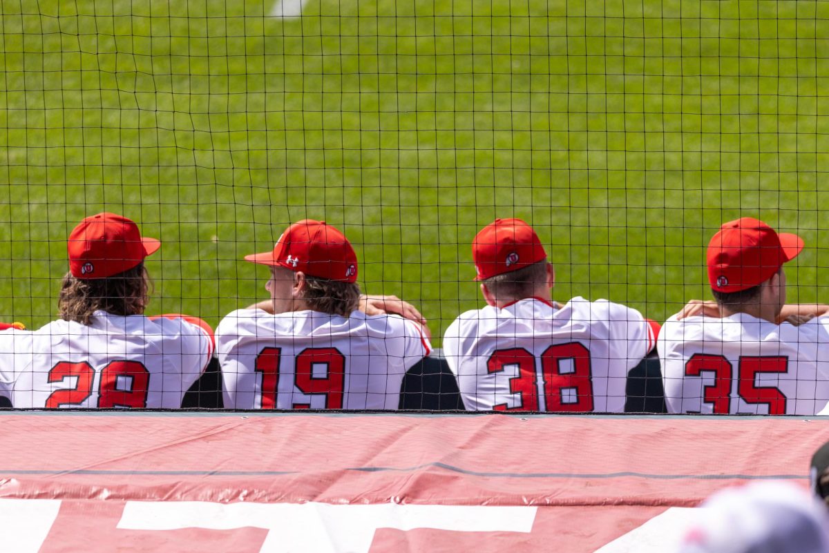 University of Utah baseball team players in the dugout during a game versus University of Washington at Smiths Ballpark in Salt Lake City, Utah on Friday, April 19, 2024. (Photo by Mary Allen | The Daily Utah Chronicle)