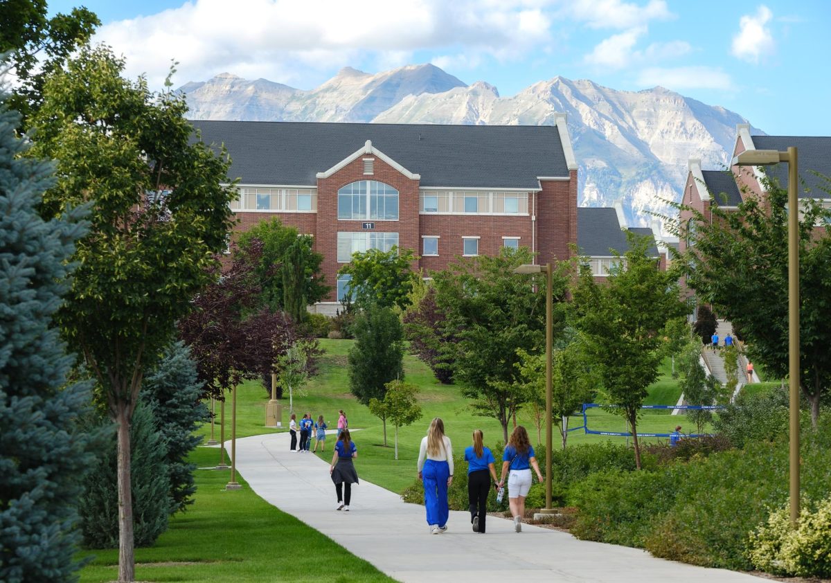 Students walking outside the Heritage Halls Buildings at the Brigham Young University campus in Provo on Saturday, Sep. 2, 2023. (Photo by Marco Lozzi | The Daily Utah Chronicle)