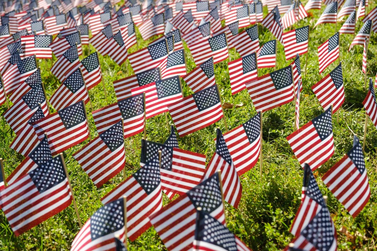 Miniature U.S. flags placed by the Young Americas Foundation as a 9/11 memorial in front of the A. Ray Olpin Student Union in Salt Lake City on Sunday, Sep. 10, 2023. (Photo by Marco Lozzi | The Daily Utah Chronicle)
