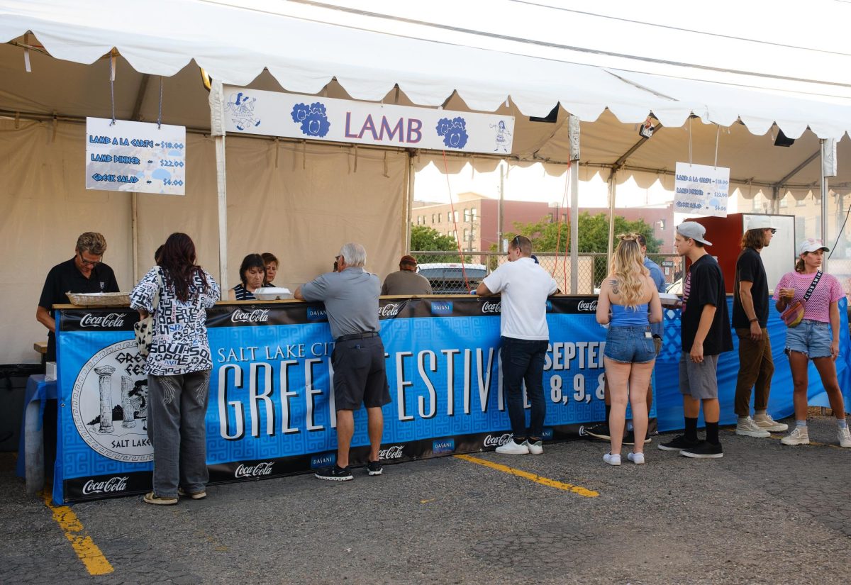 Festival attendees standing in line to purchase lamb meat during the Greek Festival in Salt Lake City on Sunday, Sept. 10, 2023. (Photo by Marco Lozzi | The Daily Utah Chronicle)