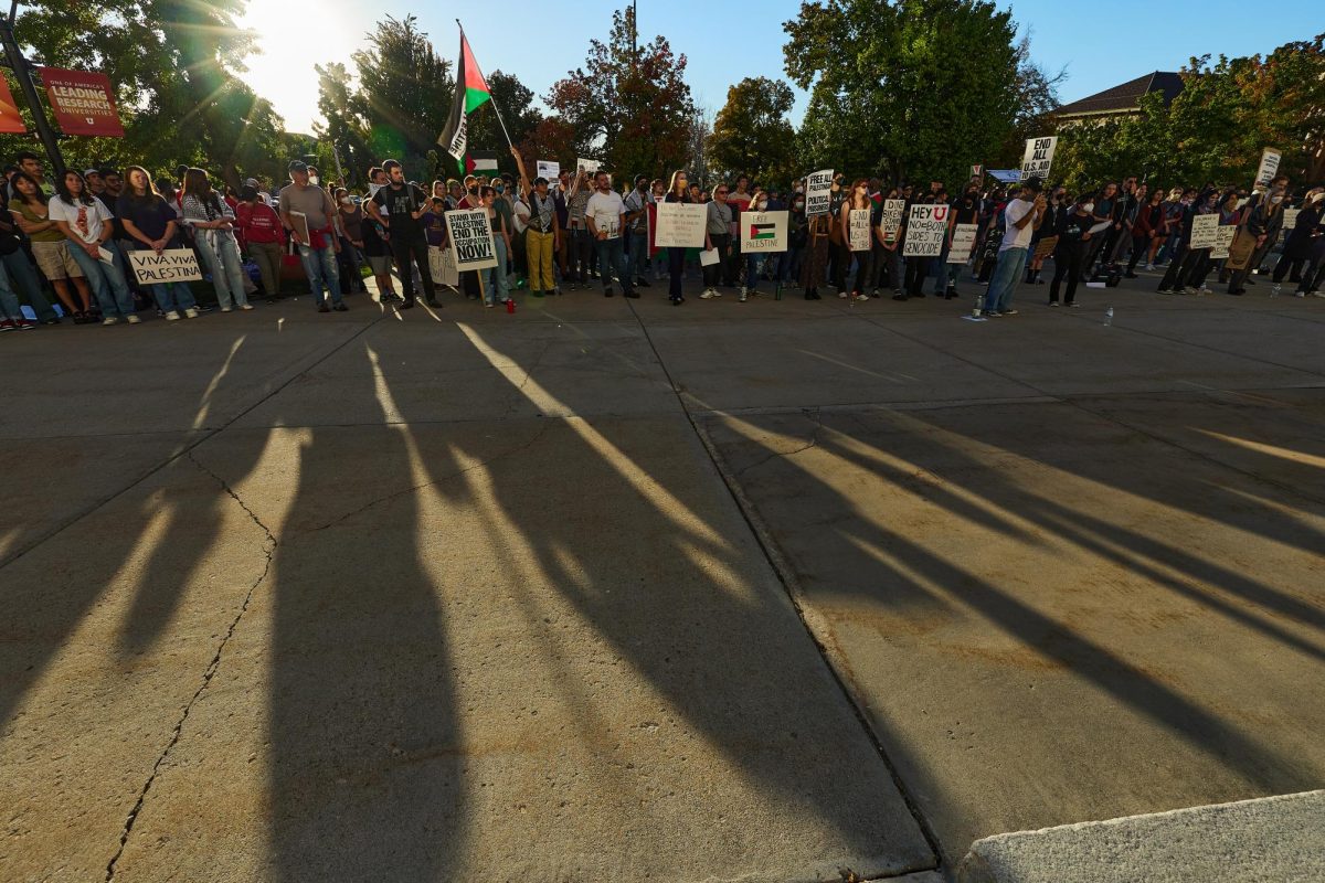 Pro-Palestine demonstrators organize in front of the John R. Park Building in Salt Lake City during the All Out For Palestine rally on Friday, Oct. 20, 2023. (Photo by Luke Larsen | The Daily Utah Chronicle)