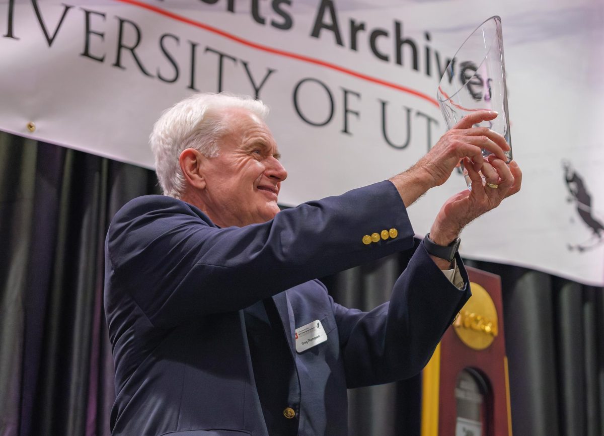 Dr. Gregory C. Thompson receives the S. J. Quinney Award during the Ski Affair event at the Cleone Peterson Eccles Alumni House in Salt Lake City on Wednesday, Oct. 25, 2023. (Photo by Marco Lozzi | The Daily Utah Chronicle)