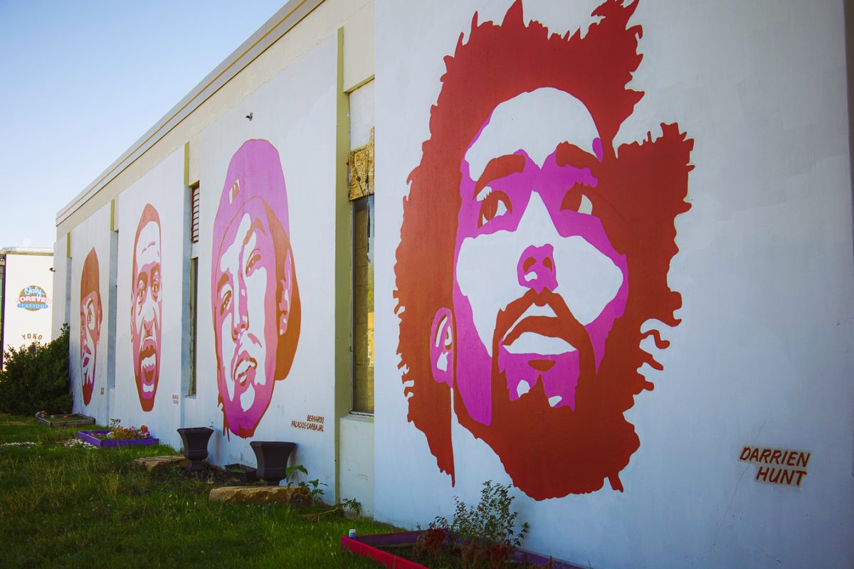 The Fleet Block Murals, which depict victims of police brutality, along industrial buildings on 300 West in Salt Lake City on Oct. 6, 2023. (Photo by Minh Polaris Vuong | The Daily Utah Chronicle)